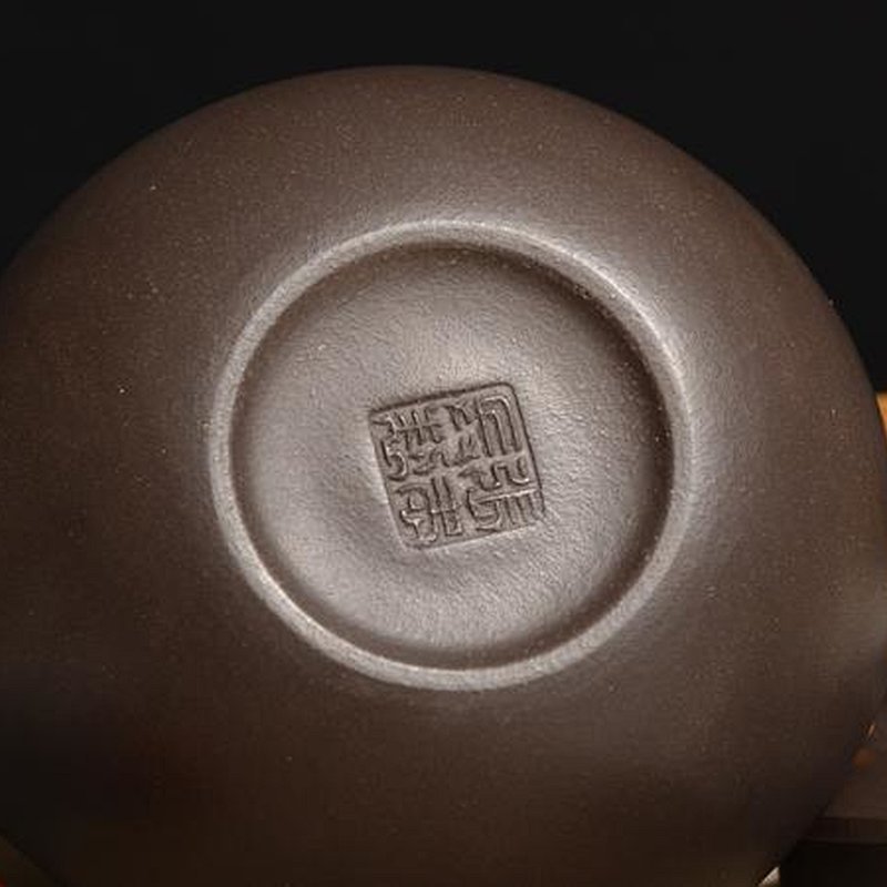 宜兴紫砂壶 | 曲壶提梁_泥料：紫泥_容量：260cc